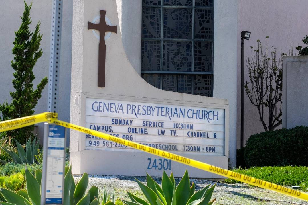 A police yellow tape is seen after a shooting inside Geneva Presbyterian Church in Laguna Woods, California, on May 15, 2022. - One person was dead and four people were "critically" injured.