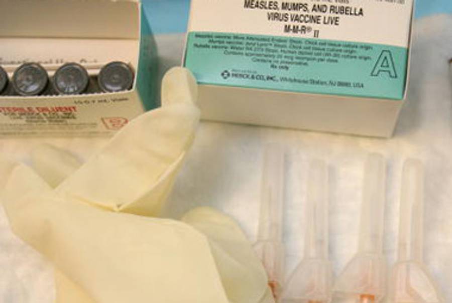 Measles, mumps, and rubella vaccine and syringes.(Mark Kegans/Getty Images)