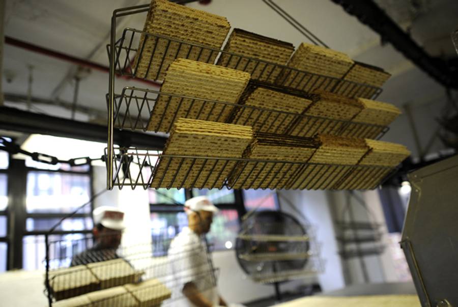 Workers at Streit’s Matzo factory on the lower east side of New York prepare matzo wafers on May 9, 2012.(TIMOTHY A. CLARY/AFP/GettyImages)