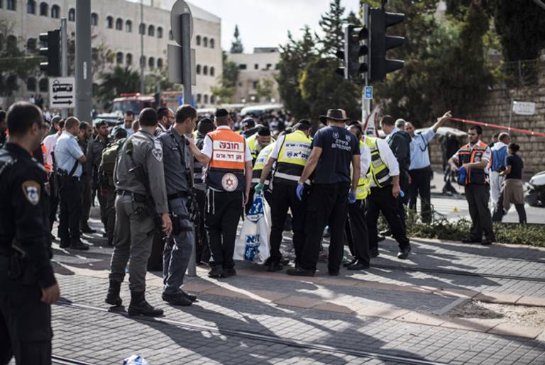 Police at the scene of a suspected terrorist attack on November 5, 2014 in Jerusalem, Israel. (Ilia Yefimovich/Getty Images)