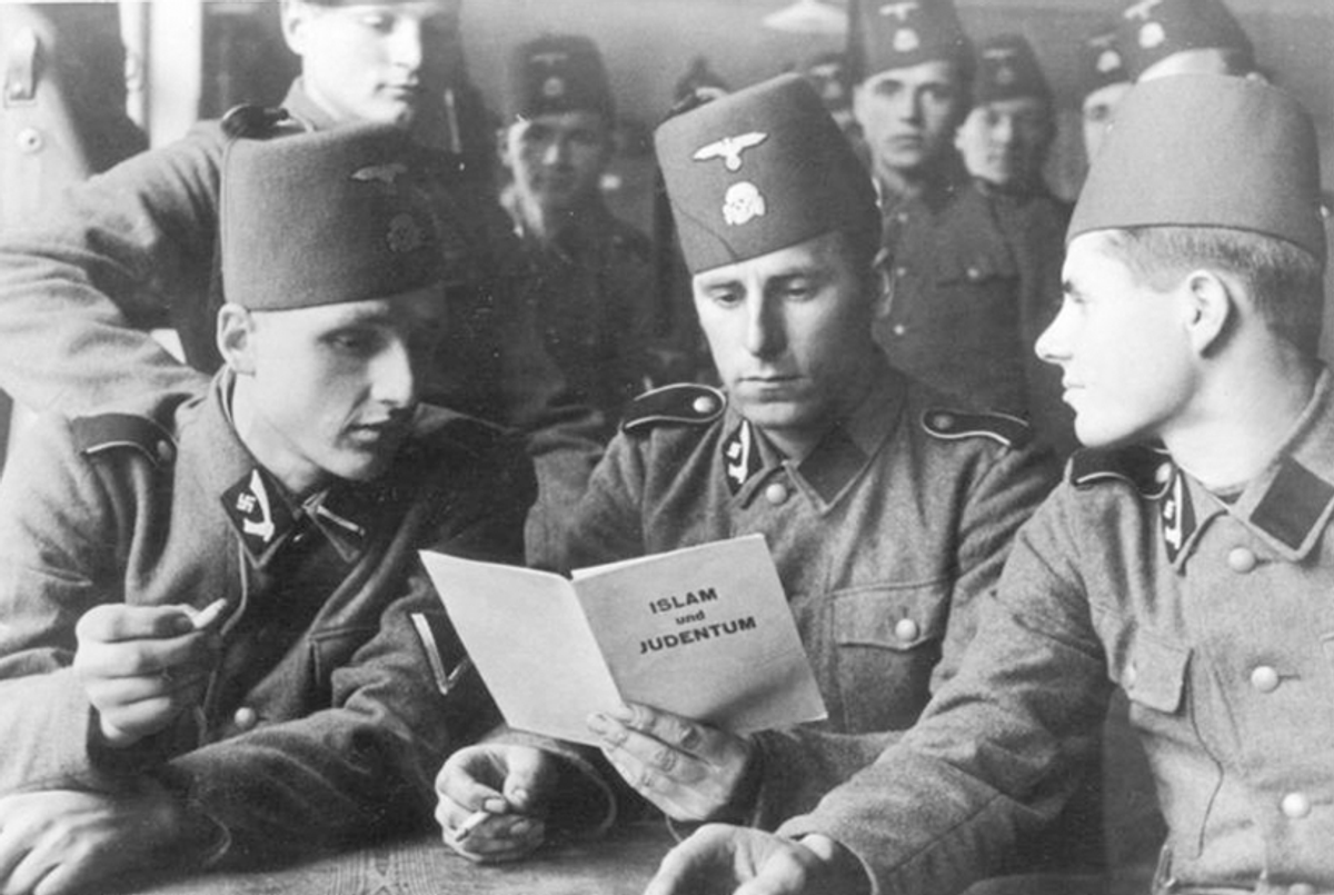Soldiers of the 13th SS Division with a brochure about "Islam and Judaism," 1943.(German Federal Archive via )