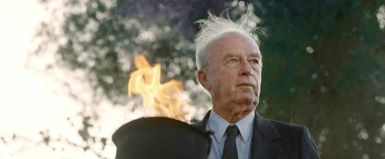 Israeli Prime Minister Yitzhak Rabin lights a flame on May 19, 1993 on Jerusalem day, at a memorial for soldiers who fell on 'Ammunition Hill', 26 years after he took the city as army Chief of Staff.
