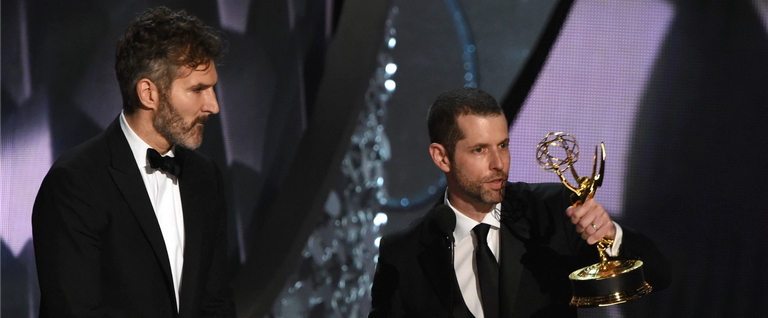 Writer/producers David Benioff (L) and D.B. Weiss accept the Outstanding Writing for a Drama Series for 'Game of Thrones' episode Battle of the Bastards during the 68th Emmy Awards show on September 18, 2016 at the Microsoft Theatre in downtown Los Angeles.
