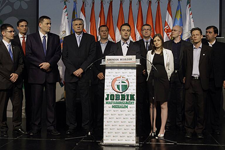 Chairman of the far-right parliamentary JOBBIK party Gabor Vona reacts to the result of the parliamentary election with his party members in Budapest on April 6, 2014. (PETER KOHALMI/AFP/Getty Images)