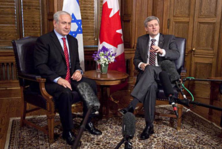 Benjamin Netanyahu and Stephen Harper on Parliament Hill in Ottawa, Ontario, on May 31, 2010, the day Israeli commandos stormed the Mari Mava.(Geoff Robbins/AFP/Getty Images)