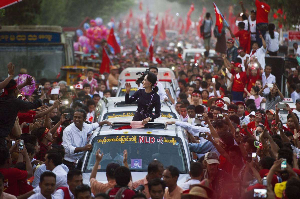 Myanmar opposition leader Aung San Suu Kyi travels in a motorcade ahead of a campaign rally for the National League for Democracy in Yangon, Myanmar, November 1, 2015. (Ye Aung Thu/AFP/Getty Images)