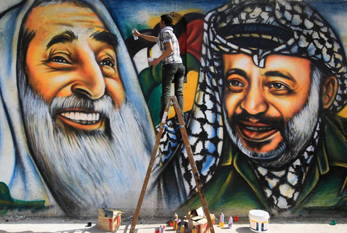 A mural in Gaza City of Sheikh Yassin (L), late leader of Hamas, and Yasser Arafat, late leader of Fath.(Mahmud Hams/AFP/Getty Images)