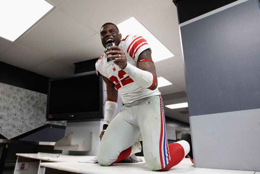 Derrick Martin of the Giants celebrates after last Sunday's victory.(Ezra Shaw/Getty Images)