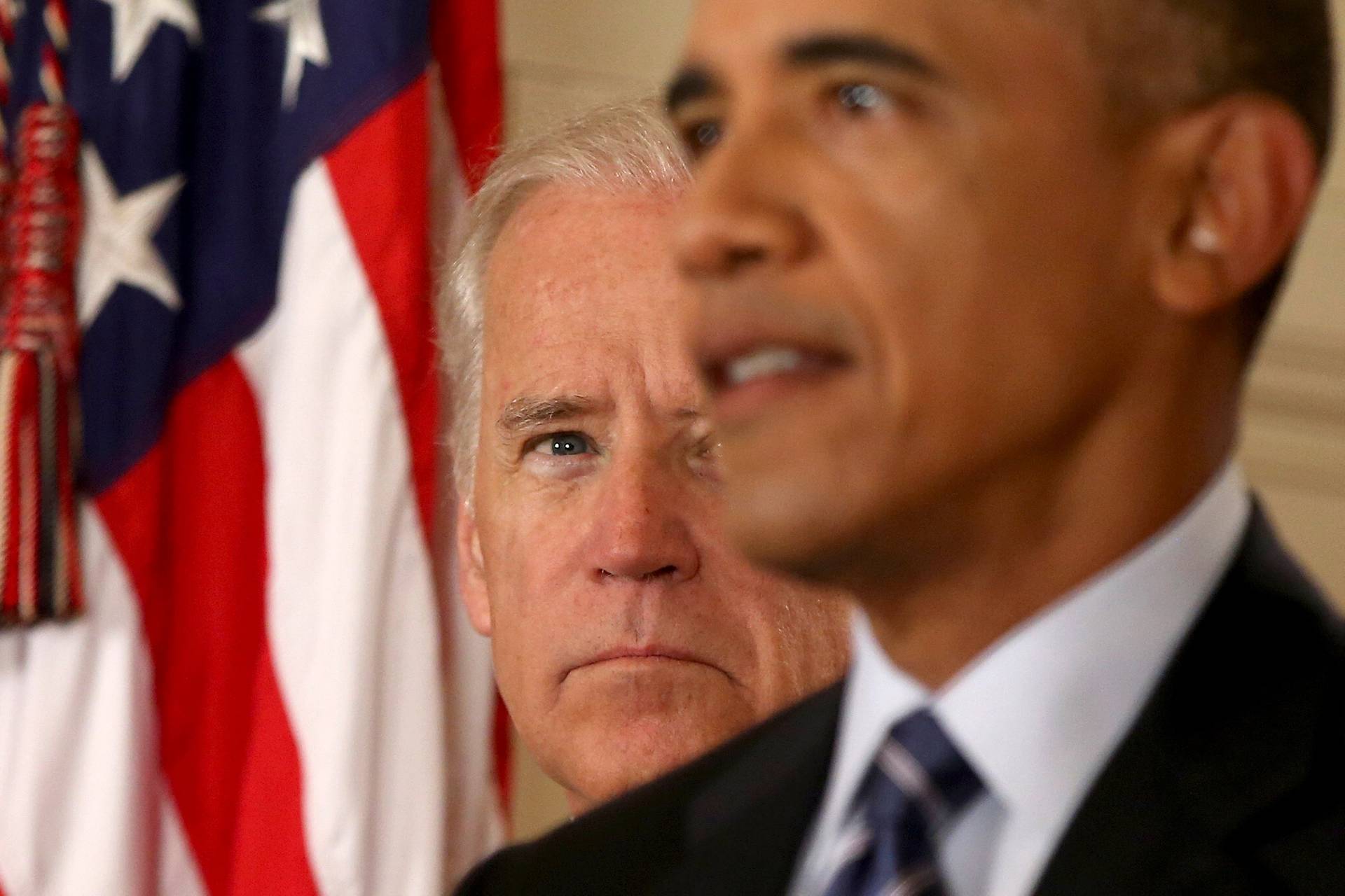 President Barack Obama, standing with Vice President Joe Biden, conducts a press conference in the East Room of the White House about the Iran nuclear deal, on July 14, 2015