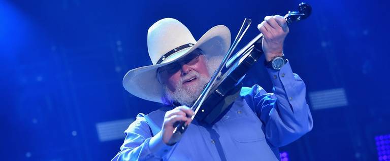 Charlie Daniels of the Charlie Daniels Band performs onstage at the 2014 CMA Festival  in Nashville, Tennessee, June 8, 2014. 