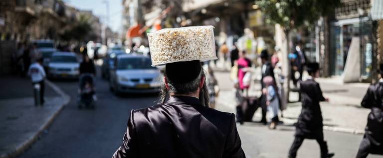 An Ultra-Orthodox Jew celebrates the holiday of Purim in Jerusalem, Israel, March 6, 2015. 