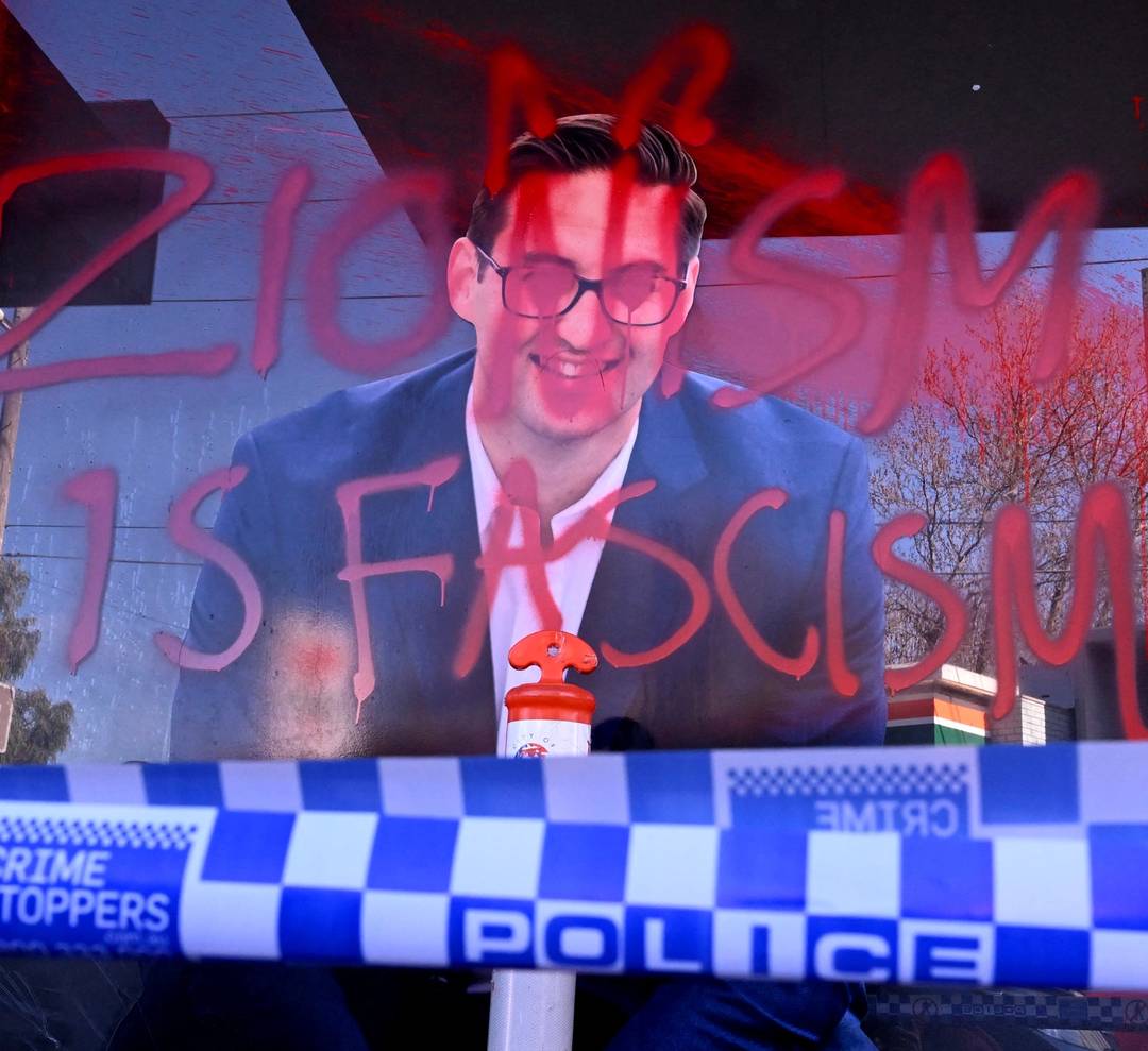 The slogan ‘Zionism Is Fascism’ is sprayed on the electoral office of Australian federal Labor Party Member of Parliament Josh Burns in the Melbourne suburb of St Kilda after police said at least five people smashed windows and painted slogans on the walls, on June 19, 2024