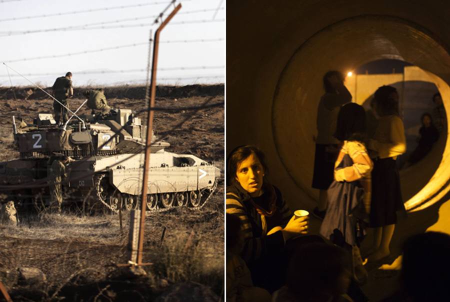 Left: An Israeli Merkava tank in the Golan Heights on Nov. 6, 2012. Right: An Israeli woman and children hide in a large concrete pipe during a Palestinian rocket attack on the Israeli town of Netivot on Nov. 12, 2012. (Menahem Kahana/AFP/Getty Images)