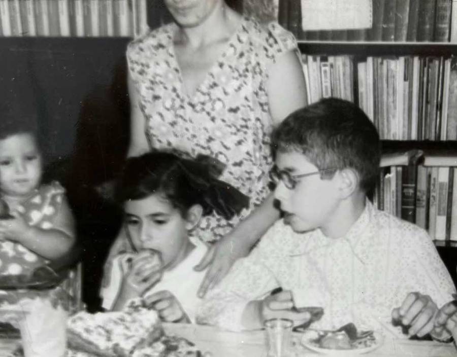 A childhood photo of the author, left, with her siblings and mother, enjoying Kutuzov during Novy God celebrations