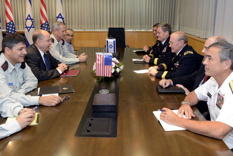  In this handout provided by the U.S. Embassy Tel Aviv, Gen. Martin E. Dempsey (3rd R), Chairman, Joint Chiefs of Staff, meets with Defence Minister Moshe Ya'alon (2nd L) on August 14, 2013 in Tel Aviv, Israel.(Matty Stern/U.S. Embassy Tel Aviv via Getty Images)